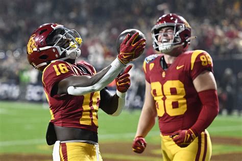 USC's Moss throws Holiday Bowl-record 6 TD passes in 42-28 victory over No. 16 Louisville